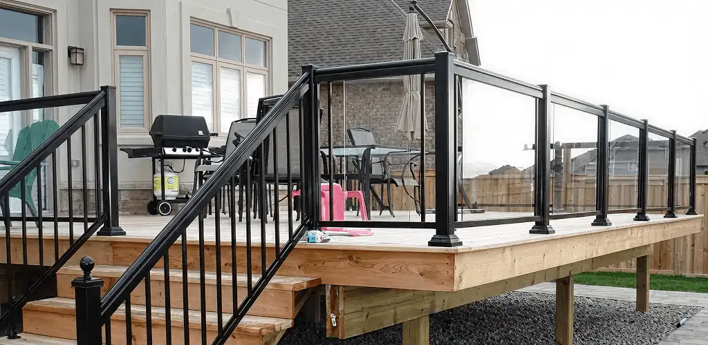 Handrail installation on a deck staircase for safety and code compliance in Detroit, MI